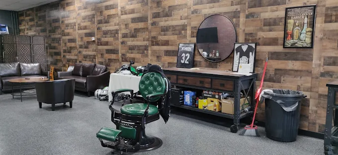 Vintage green barber chair inside Lucky's
