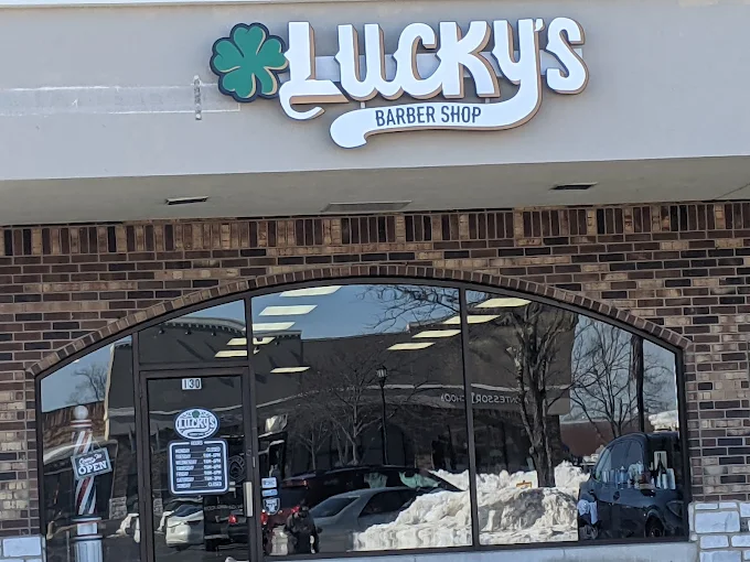 Lucky's Barber Shop storefront in Bartlett